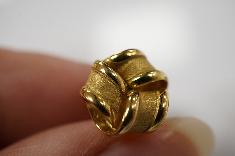 A pair of 18ct yellow gold stud earrings of knotted design with a textured finish, 1.1cm diameter each, post fittings, British hallmarks, gross weight 3.5 grams